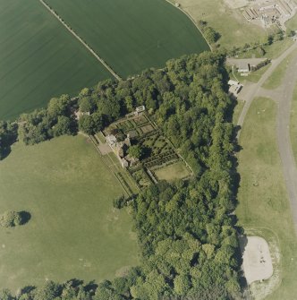 Aerial view of Earlshall country house, formal garden and dovecot, taken from the SSW.
