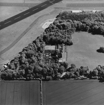 Aerial view of Earlshall country house, formal garden and dovecot, taken from the NNW.