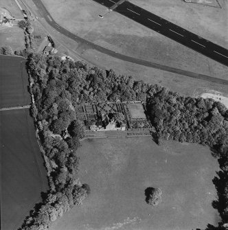 Aerial view of Earlshall country house, formal garden and dovecot, taken from the W.