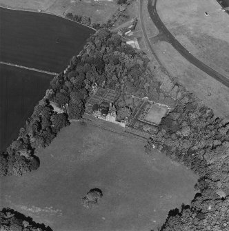 Aerial view of Earlshall country house, formal garden and dovecot, taken from the WSW.