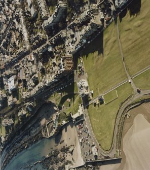 Oblique aerial view centred on the Royal and Ancient Golf Club, St Andrews.