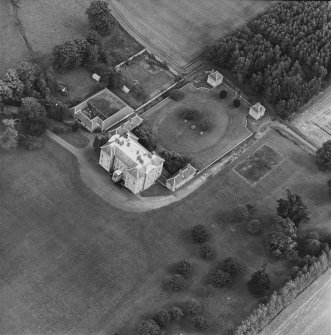 Oblique aerial view centred on the country house, garden, pavilions and lodges, taken from the W.