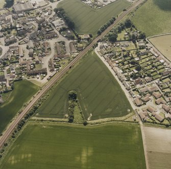 Oblique aerial view of Kingskettle village, taken from the NNW.