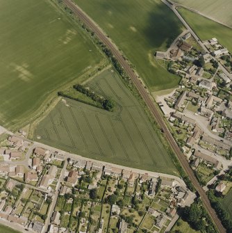 Oblique aerial view of Kingskettle village, taken from the SW.