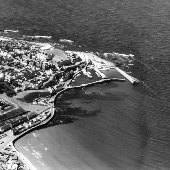 Aerial view of Banff harbour including North pier and beacon and part of town.