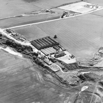 Oblique aerial view from North-West.