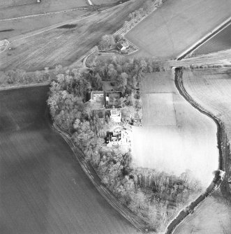 Oblique aerial view centred on the castle and tower-house, taken from the WNW.