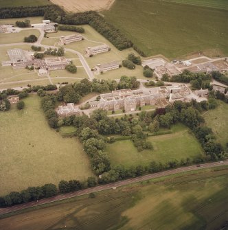 Oblique aerial view of the hospital, taken from the SSE.