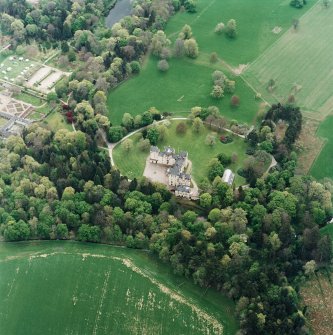 Oblique aerial view centred on Fyvie Castle, taken from the NW.