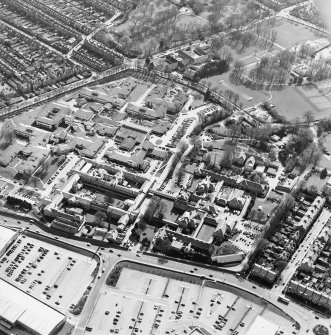 Oblique aerial view centred on the hospital and obelisk, taken from the NE.