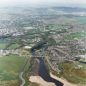 General oblique aerial view up the River Don from the Bridge of Don, taken from the E.