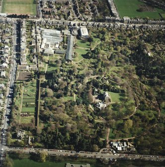 Oblique aerial view of the botanical garden centred on the art gallery, house, tea room and café, taken from the WSW.