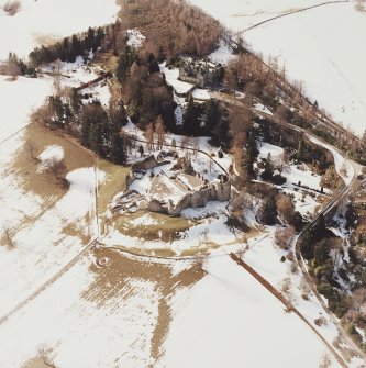 Oblique aerial photograph, taken from the E, centred on Kildrummy Castle.