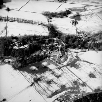 Oblique aerial photograph, taken from the SSE, centred on Kildrummy Castle.