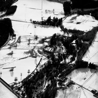 Oblique aerial photograph, taken from the NNE, centred on Kildrummy Castle.