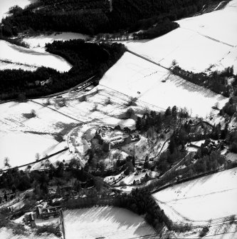Oblique aerial photograph, taken from the N, centred on Kildrummy Castle.