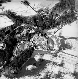 Oblique aerial photograph, taken from the SSW, centred on Kildrummy Castle.