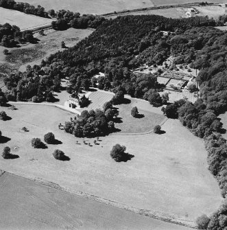 Oblique aerial view of Leith Hall centred on the country house and walled garden, taken from the E.