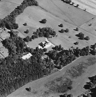 Oblique aerial view of Leith Hall centred on the country house and offices, taken from the SW.