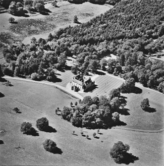 Oblique aerial view of Leith Hall centred on the country house, taken from the NE.