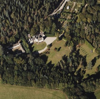 Oblique aerial view of Candacraig House and grounds centred on the country house, taken from the S.