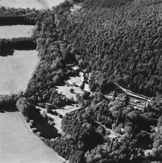 Oblique aerial view of Candacraig House and grounds centred on the country house, taken from the E.