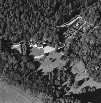 Oblique aerial view of Candacraig House and grounds centred on the country house, taken from the SSE.