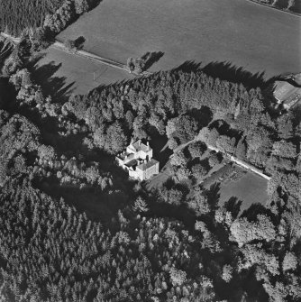 Oblique aerial view of Craig Castle centred on the castle with walled garden and farmsteading adjacent, taken from thr S.