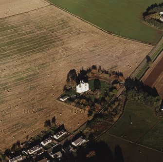 Oblique aerial view of Leslie Castle centred on the castle, taken from the SW.