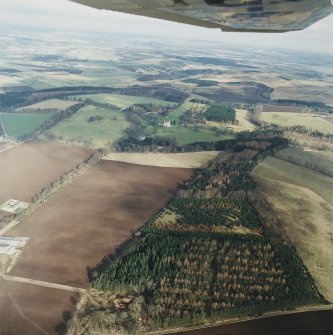 General oblique aerial view of the tower-house and its policies, taken from the SW.