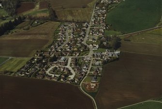 Oblique aerial view centred on the village, taken from the SE.