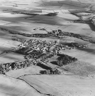 Oblique aerial view of Rhynie centered on the village, taken from the NW.