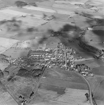 Oblique aerial view of Rhynie centered on the village, taken from the SW.