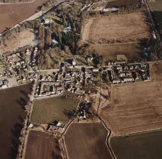 Oblique aerial view of the village taken from the W.