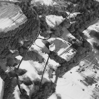Oblique aerial view centred on Udny Castle and gardens taken from the SW.