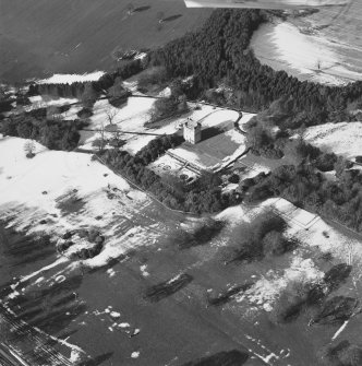 Oblique aerial view centred on Udny Castle and gardens taken from the SE.