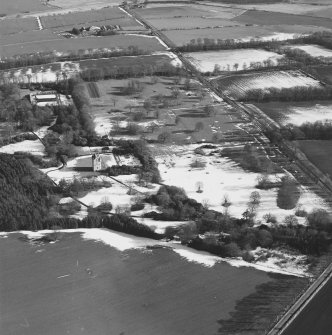 Oblique aerial view centred on Udny Castle and gardens taken from the W.