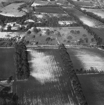 Oblique aerial view centred on Udny Castle and gardens taken from the SSE.
