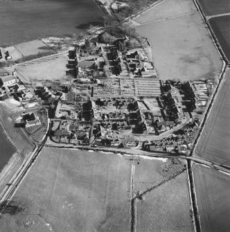 Oblique aerial view of Udny Green village taken from the W.