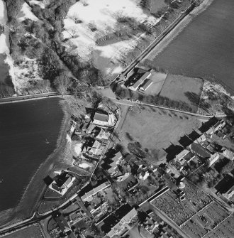 Oblique aerial view of Udny Green village taken from the SW.