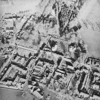 Oblique aerial view of the church and burial-ground taken from the WSW.