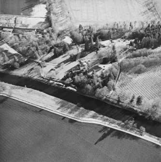 Oblique aerial view centred on the tower-house taken from the N.