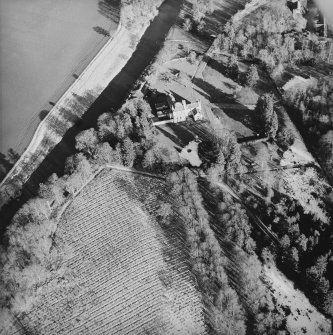 Oblique aerial view centred on the tower-house taken from the W.