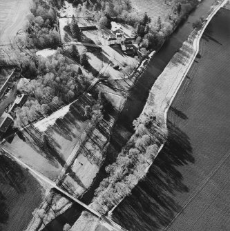 Oblique aerial view centred on the tower-house taken from the E.