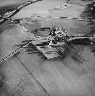 Oblique aerial view centred on the tower-house taken from the W.
