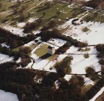 Oblique aerial view centred on Udny Castle and gardens taken from the NW.