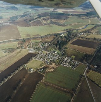 General oblique aerial view centred on Monymusk village, taken from the SW.