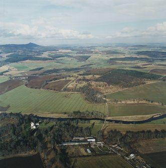 General oblique aerial view looking across Monymusk House towards Bennachie, taken from the SSW.