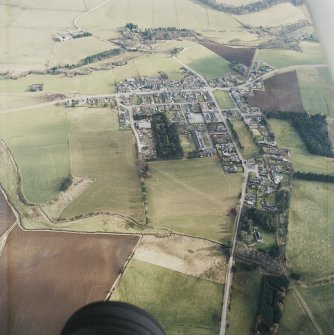 Oblique aerial view centred on the village, taken from the NW.