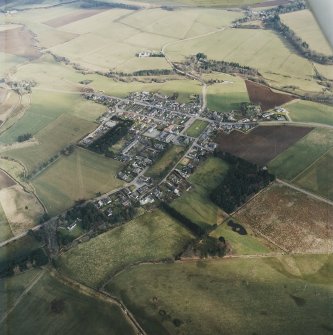 Oblique aerial view centred on the village, taken from the W.